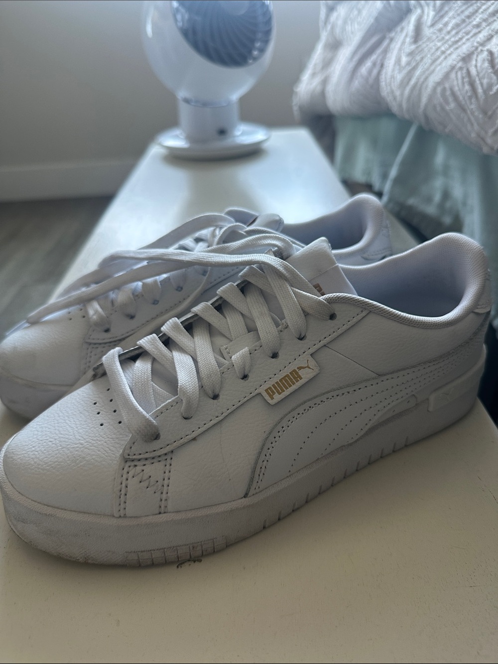 Puma Women’s White Low-Top Leather Sneakers with Gold Logo
